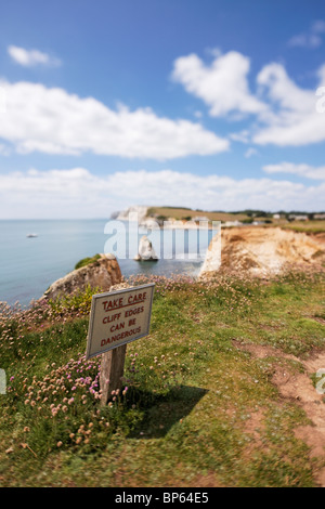 Una vista della baia di acqua dolce e "prendersi cura" segno. Foto Stock