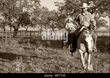 Cowboy a cavallo Foto Stock