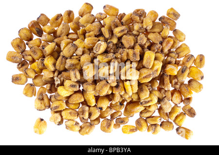 Pila di tostati e salati croccanti i dadi di mais snack Foto Stock