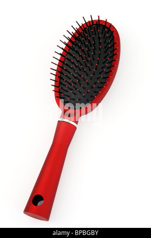 Capelli rossi spazzola su sfondo bianco Foto Stock