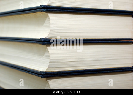 Pila di libri antichi per la texture e background. Foto Stock