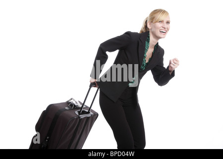 Viaggiare donna in fretta Foto Stock