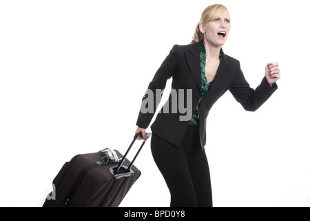 Viaggiare donna in fretta Foto Stock