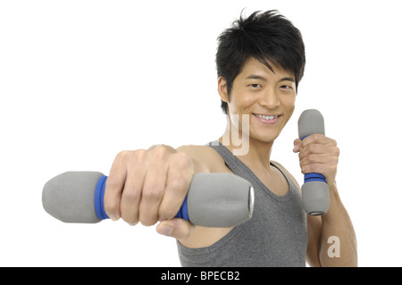 Ritratto di un giovane uomo con un manubrio Foto Stock