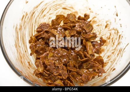 Cup Cake mescolare ingredienti fuso e miscelato in recipiente di vetro. Foto Stock
