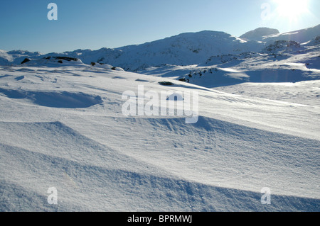 Derive di neve sul vertice di Seathwaite cadde nel distretto del Lago Foto Stock