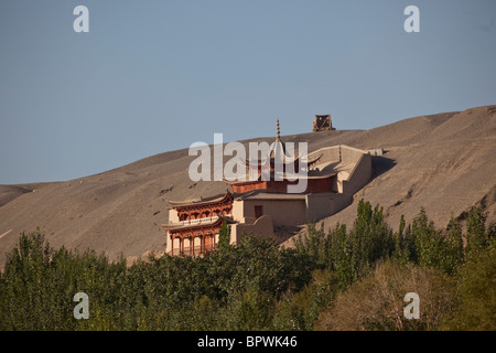 Grotte Mogoa contenenti statue buddiste e arte vicino a Dunhuang, del Gansu in Cina. Foto Stock