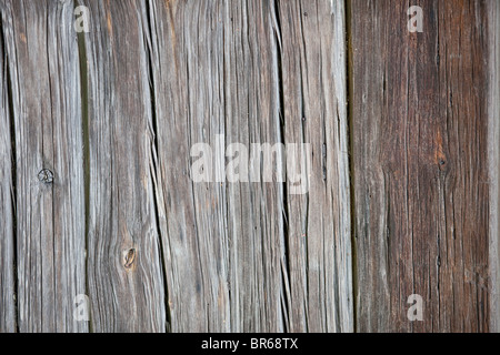 Il vecchio muro di casa fatta di legno vecchio Foto Stock