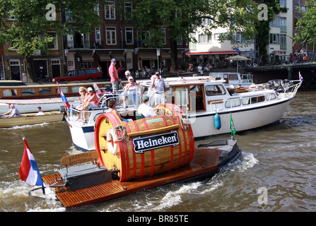 I turisti divertirsi sul canal Amsterdam, Olanda, Paesi Bassi Foto Stock