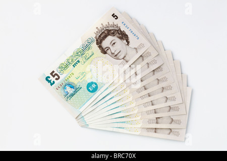 Cinquanta sterline in cinque pound note Foto Stock