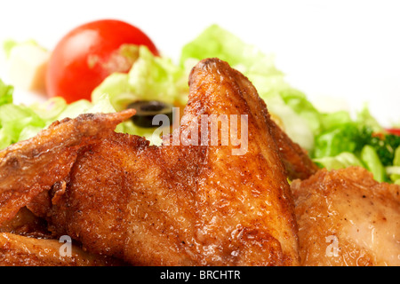 Cosce di pollo con verdure fresche Foto Stock