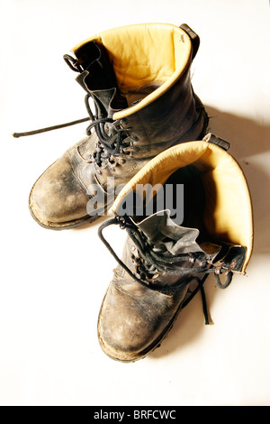 Sporchi stivali in pelle Foto Stock