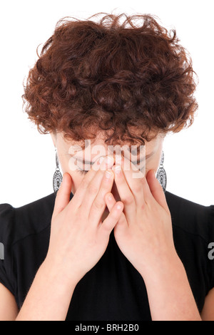 Triste donna con testa in mani isolato su bianco Foto Stock