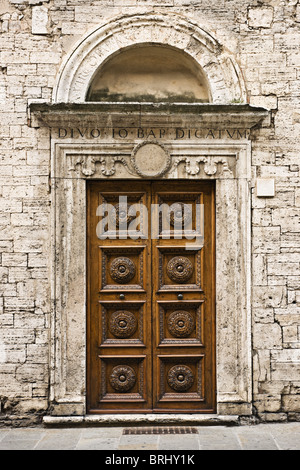 Merchants Guild porta in Palazzo dei Priori, Perugia, Umbria, Italia Foto Stock