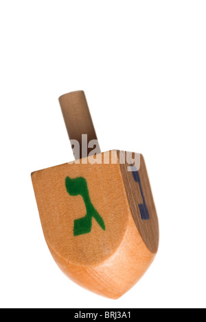 Hanukkah dreidel, isolato su sfondo bianco. Foto Stock