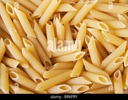 Macro closeup di penne pasta texture di sfondo Foto Stock