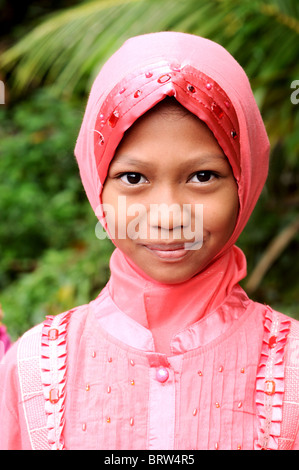 La ragazza di belakang padang, isole Riau, INDONESIA Foto Stock