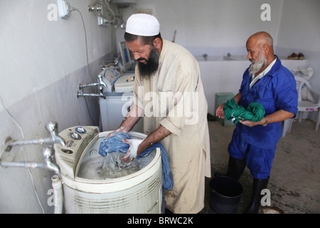 Servizio di lavanderia presso un ospedale afghano Foto Stock