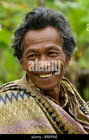 Uomo sorridente, Tana Toraja, Sulawesi meridionale, Indonesia Foto Stock