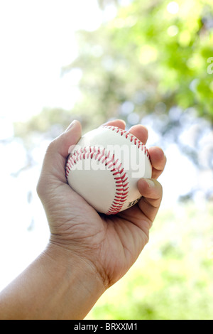 Uomo di baseball di contenimento Foto Stock