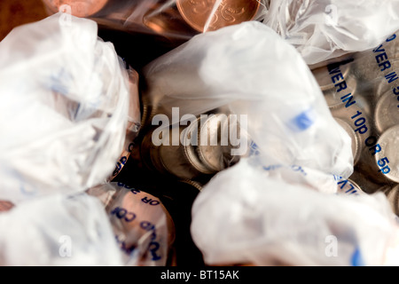 Salvate le monete in sacchi di denaro per prendere per la banca Foto Stock