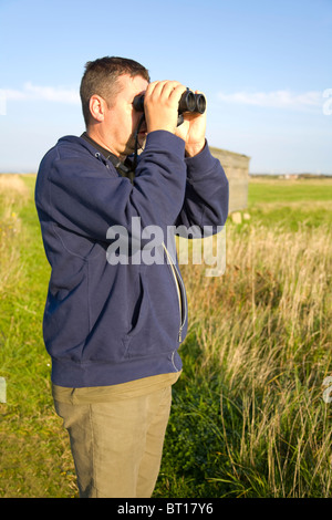 Birdwatching a disprezzare Foto Stock