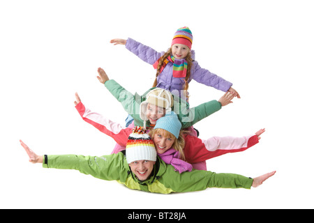 La famiglia felice membri disteso con le braccia tese Foto Stock