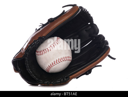 Softball guanto e sfera di esclusione di studio Foto Stock