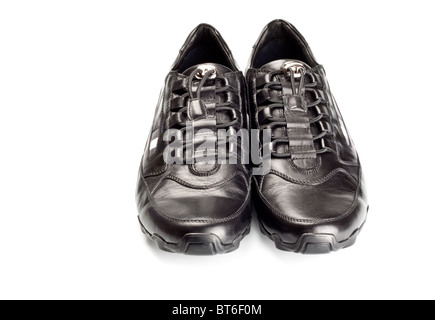 Scarpe sportive coppia isolata su bianco Foto Stock