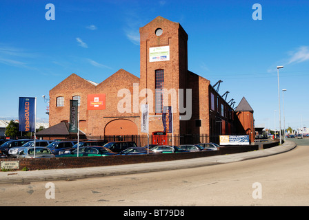 Ex edifici Dock in Brunswick Dock, a sud di Liverpool Docks, ora utilizzato per le altre imprese. Foto Stock