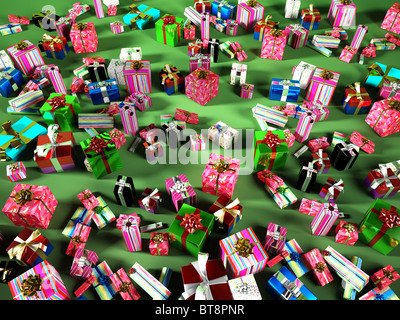 Grande gruppo di Natale giftson una superficie verde Foto Stock