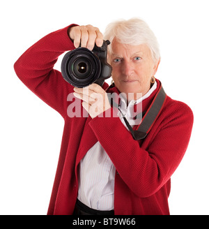 Un senior donna è fotografare voi. Foto Stock