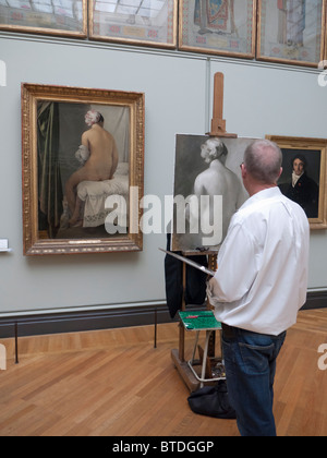 Artista la copia di un dipinto al museo del Louvre a Parigi Francia Foto Stock