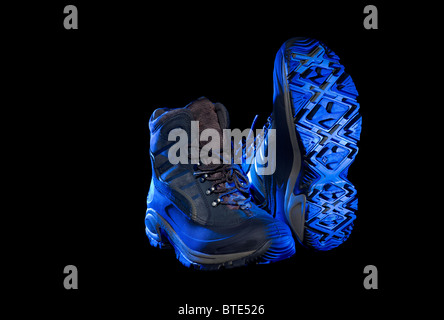 Trekking stivali scarpe in blu spensierata andare libero andando luce piedi piedi intaglio Foto Stock