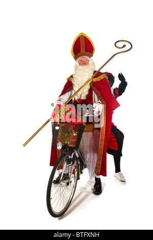 Sinterklaas e Nero Piet sulla bici Foto Stock