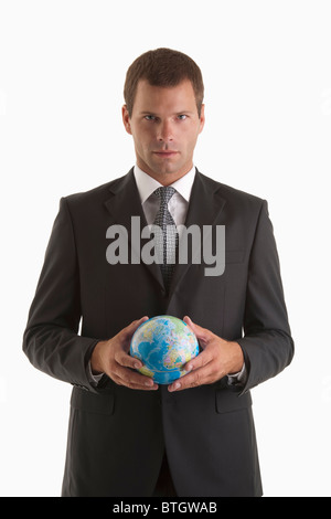 L'uomo holding globe Foto Stock