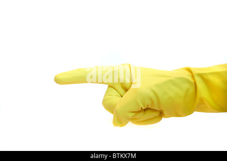 Una mano umana in giallo sfida rivolta a qualcosa. Tutti gli isolati su sfondo bianco. Foto Stock