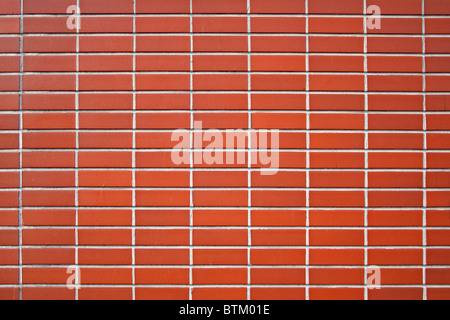 Una texture di un rosso mattone parete. Utile come sfondo. Foto Stock