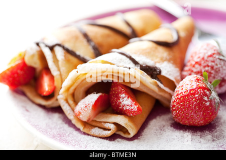 Crepes e fragole Foto Stock