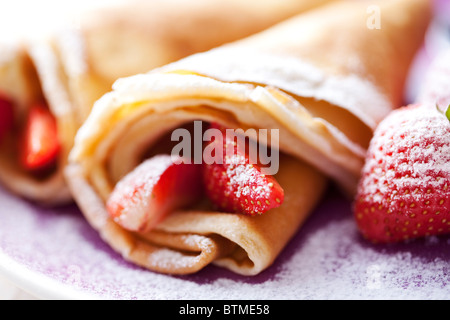 Crepes e fragole Foto Stock