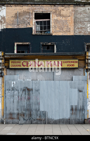 Abbandonato un ristorante Cinese e un edificio abbandonato su Dalston Lane a Hackney. Foto Stock