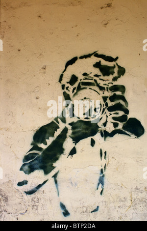 Graffiti del giovane di scattare una fotografia Foto Stock