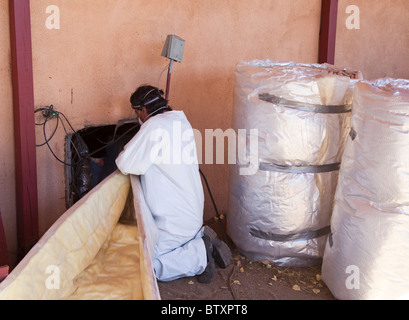 Gruppo di veterani non Weatherization per famiglia Low-Income Foto Stock