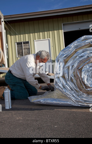 Gruppo di veterani non Weatherization per famiglia Low-Income Foto Stock