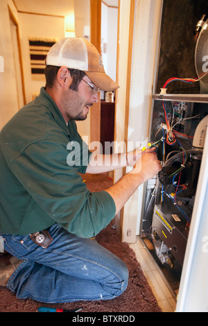 Gruppo di veterani non Weatherization per famiglia Low-Income Foto Stock