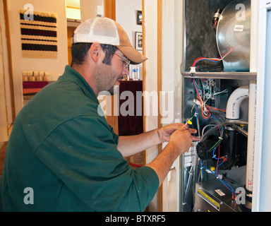 Gruppo di veterani non Weatherization per famiglia Low-Income Foto Stock