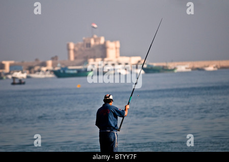 Il pescatore solitario. Foto Stock