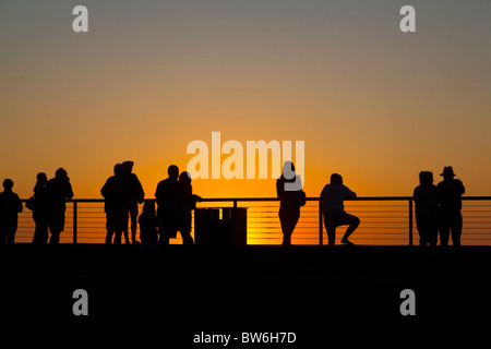 Silhouette al tramonto Foto Stock