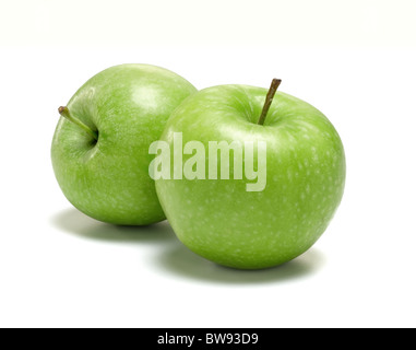 Due verdi Granny Smiths mele per tagliare Foto Stock