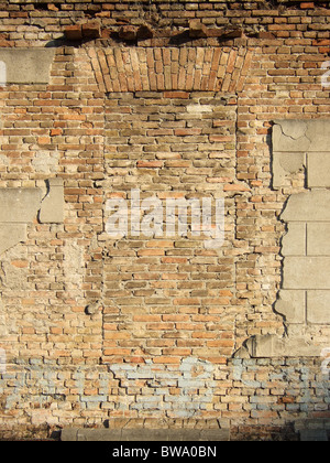 Una parete con una murata ingresso Foto Stock